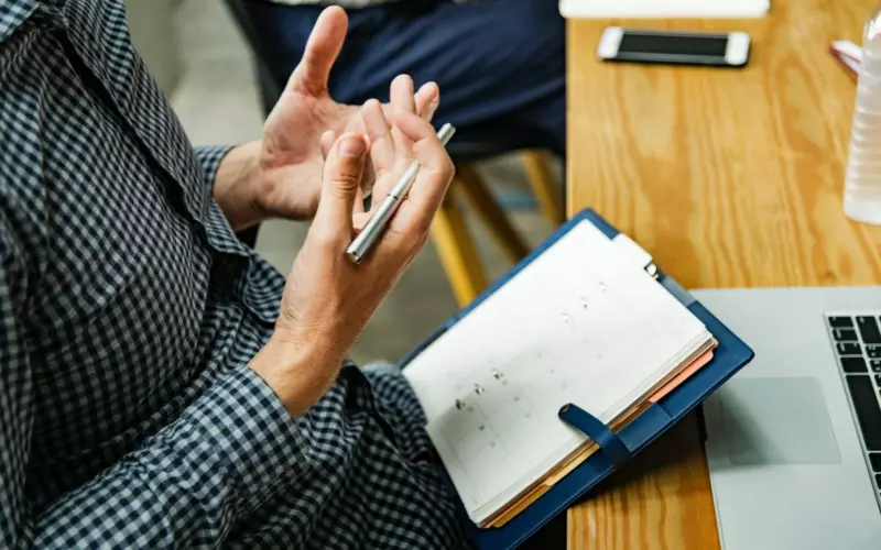 Man Holding Diary